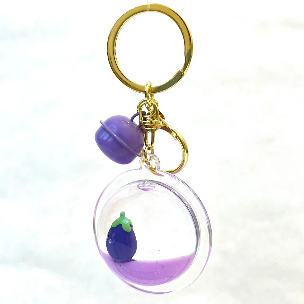 12082 EGGPLANT FLOATY CHARM-12