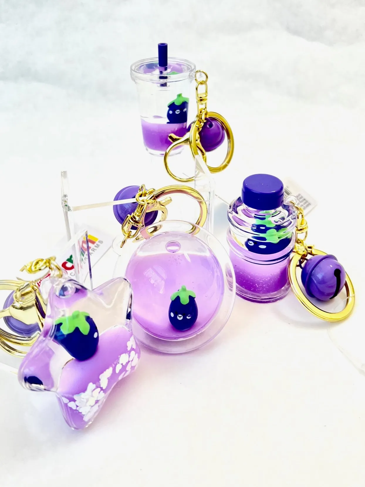 12082 EGGPLANT FLOATY CHARM-12