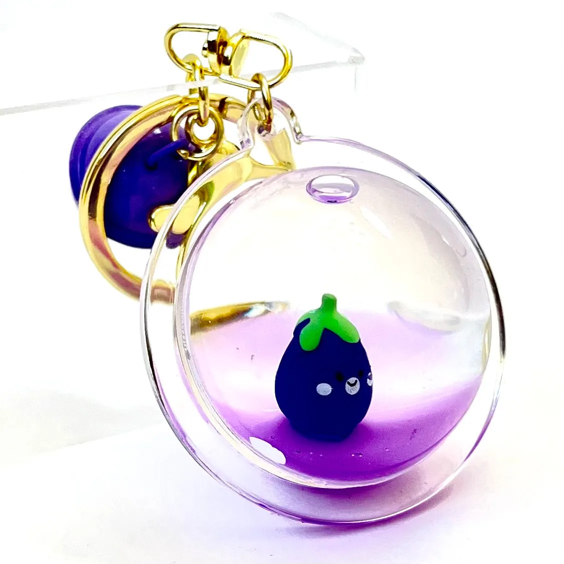 12082 EGGPLANT FLOATY CHARM-12