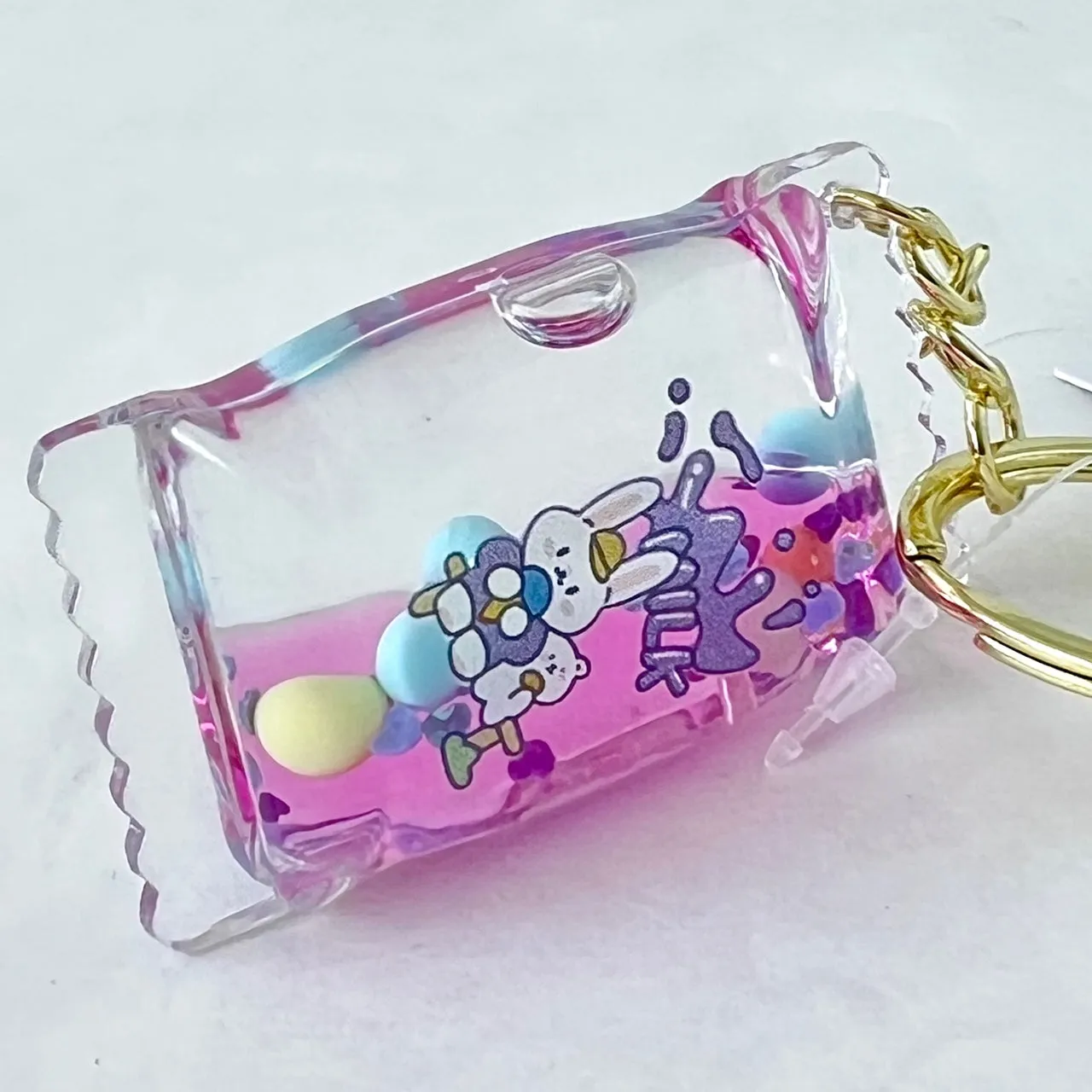 12112 BUNNY CANDY FLOATY KEY CHARM-12