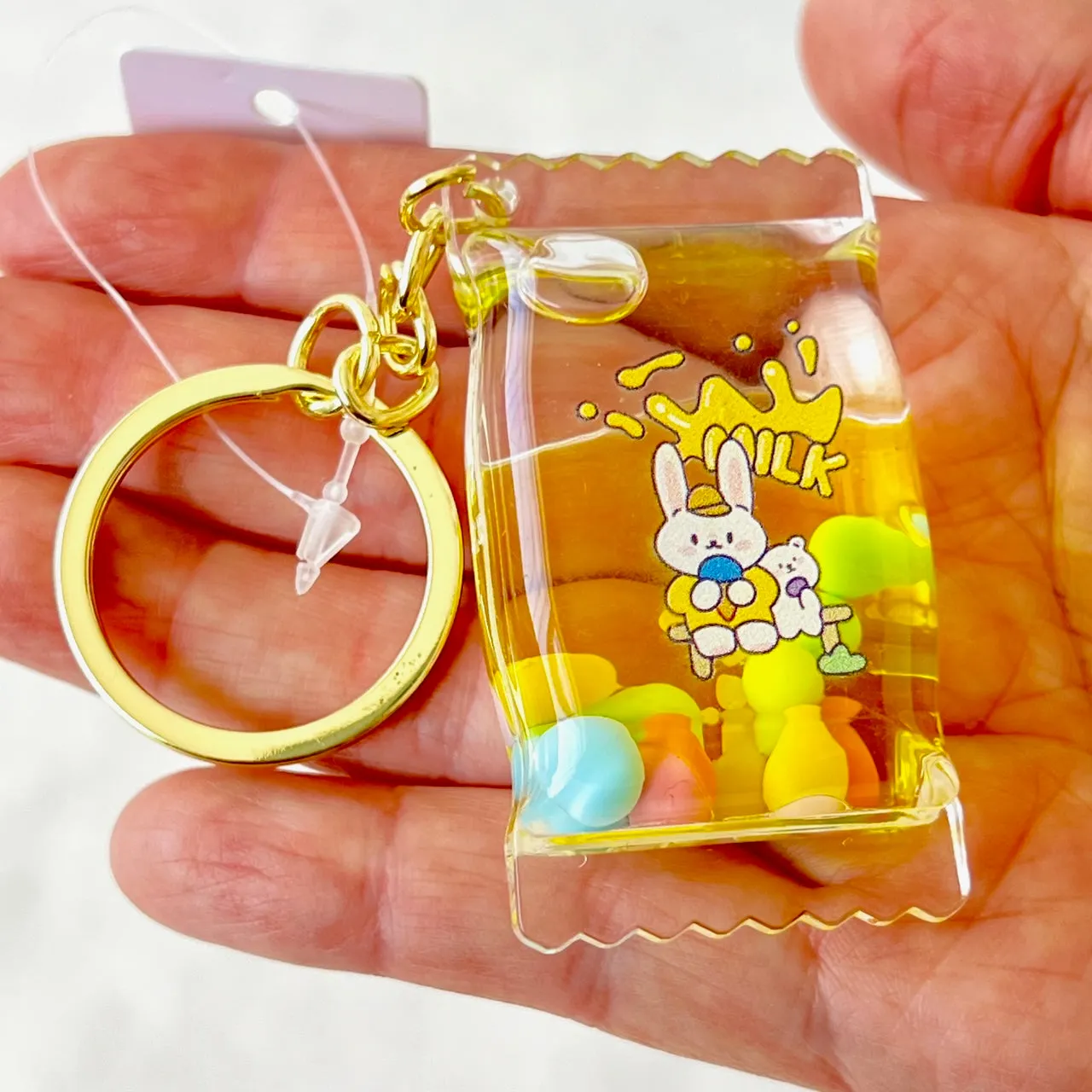 12112 BUNNY CANDY FLOATY KEY CHARM-12