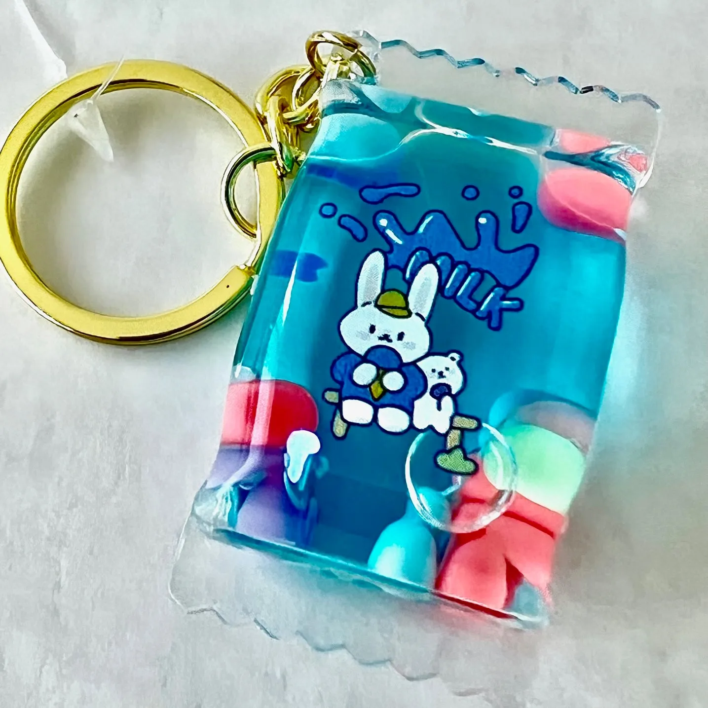 12112 BUNNY CANDY FLOATY KEY CHARM-12